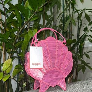 POOLSIDE ‘The Love Song’ shell bag in Pink